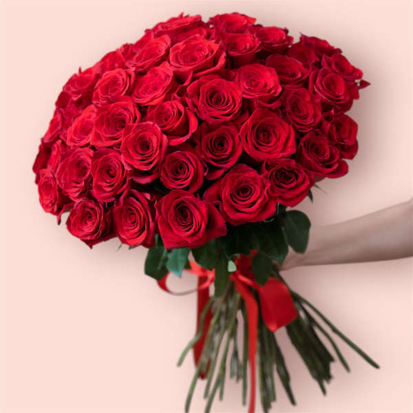 Large bouquet of red roses tied with a red ribbon