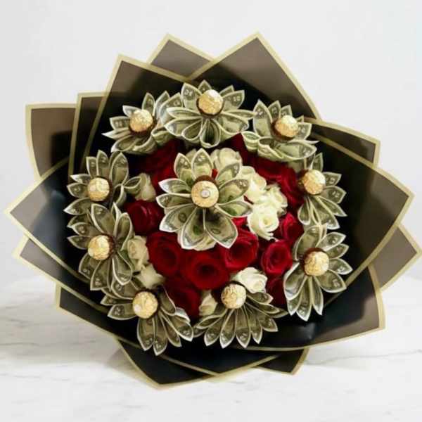 Bouquet of red and white roses wrapped with folded dollar bills