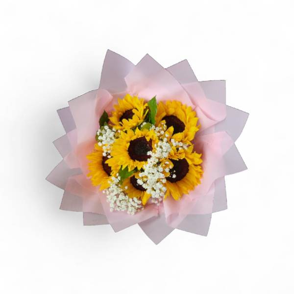Bouquet of sunflowers wrapped in pink paper