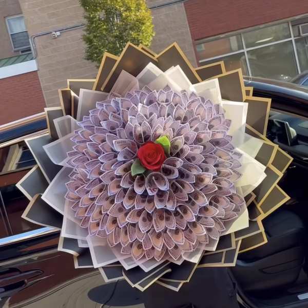 Money bouquet with a red rose center