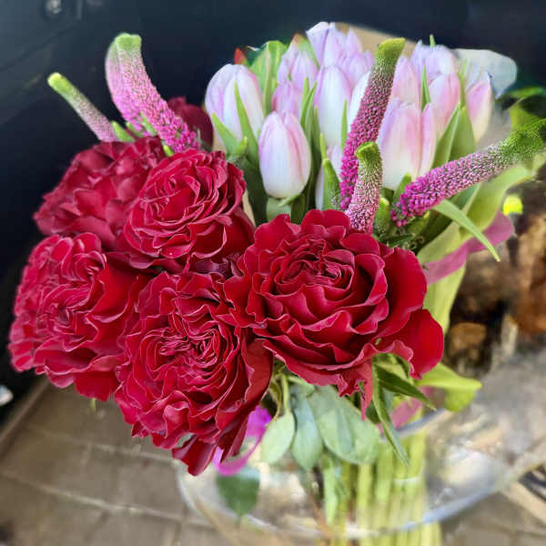 Hydrangeas , tulips ,red rose arrangement