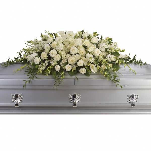 White floral casket spray with roses and calla lilies