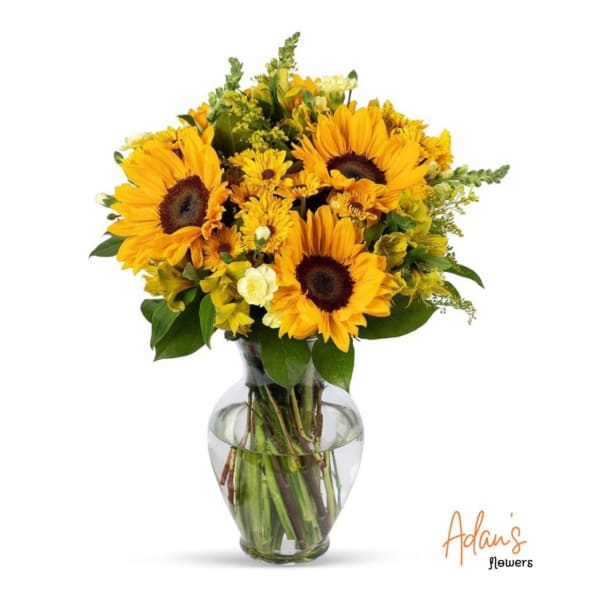 Sunflower bouquet in a clear glass vase