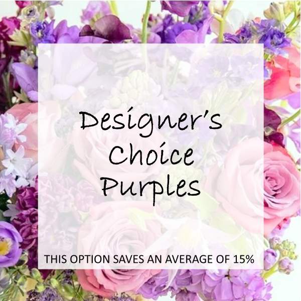 Purple floral arrangement with pink roses and mixed blooms