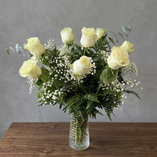 Dozen's white roses