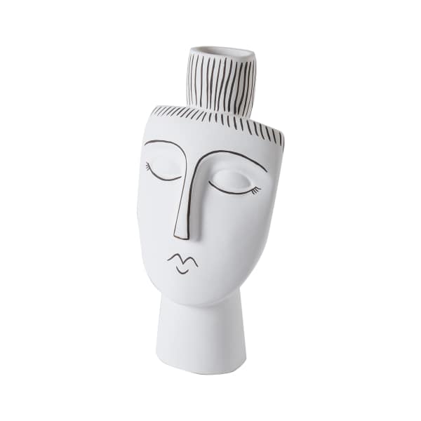 White ceramic face vase with black line details