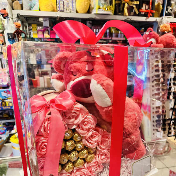 Pink teddy bear gift box with faux roses and chocolates