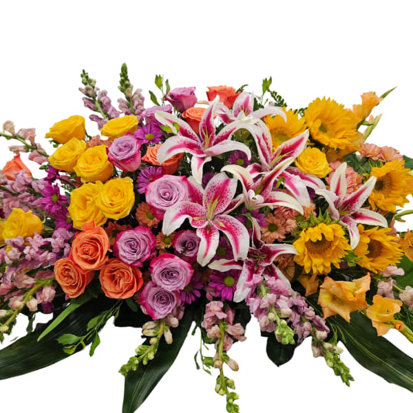 Mixed bouquet with pink lilies, roses, and sunflowers