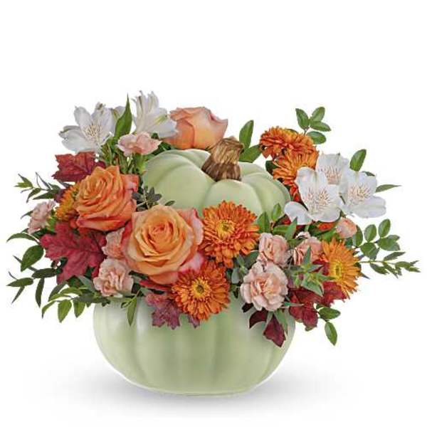 Pumpkin-shaped vase with orange and white flowers