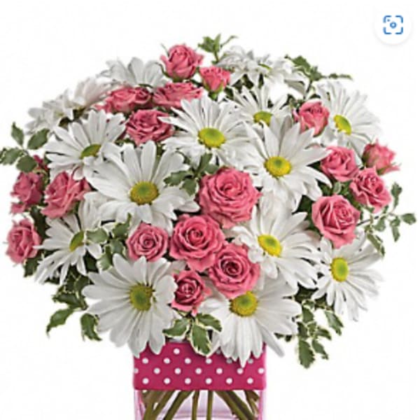 Pink roses and white daisies in a pink polka-dot vase
