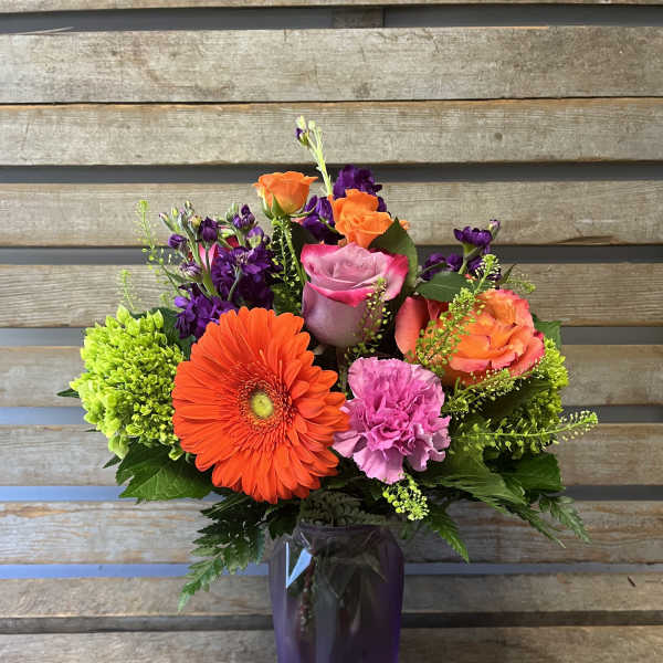 Sofia vase purple and orange flowers ( designer's choice of flowers)