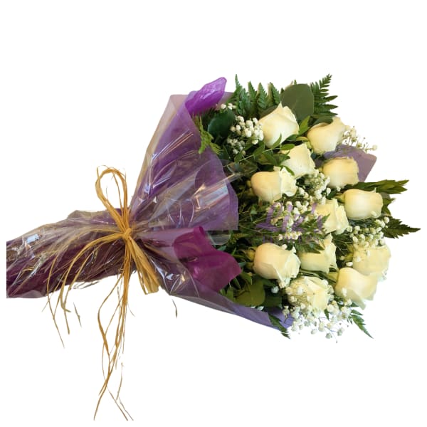 Bouquet of cream roses wrapped in purple cellophane with a raffia tie
