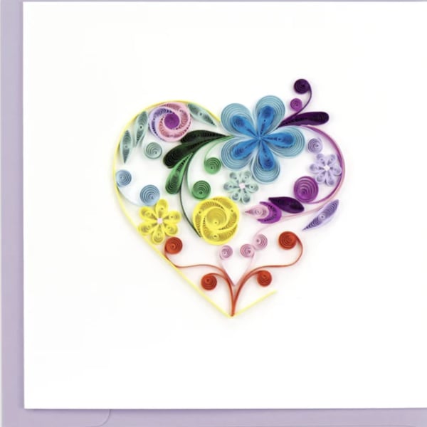 Greeting card with a rainbow quilled paper heart filled with stylized flowers on a white background