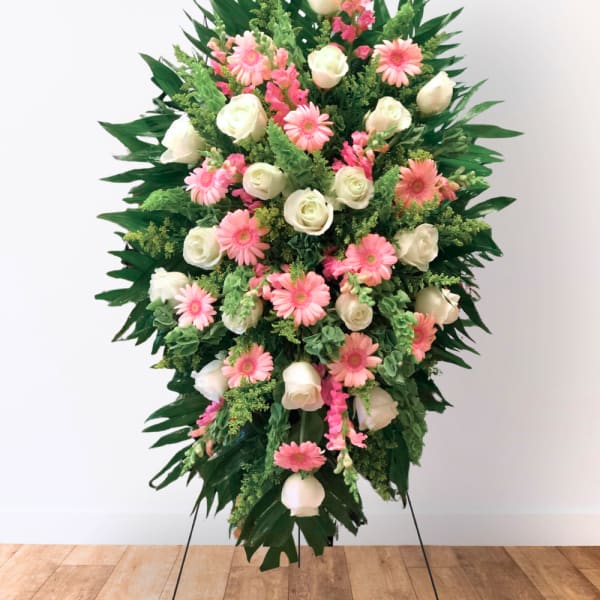 Standing floral spray with pink daisies and white roses