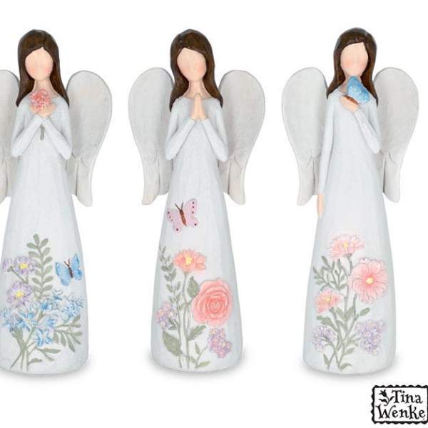 Three angel figurines with floral designs and butterflies