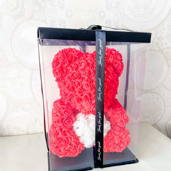 Heart-shaped red rose gift box with a white rose accent