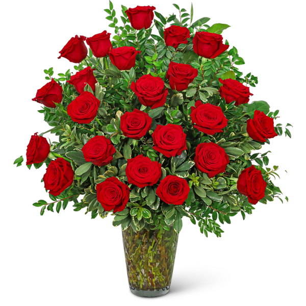 Red roses arranged in a clear glass vase