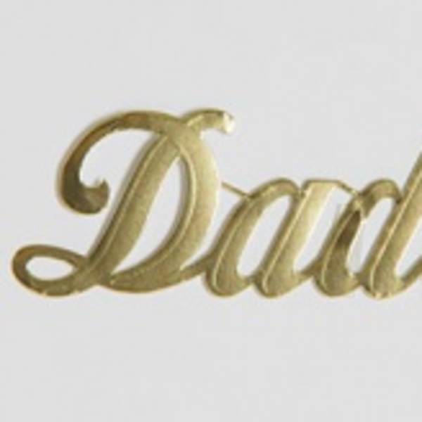 Gold script word "Daddy" on a white background