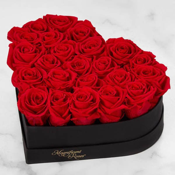 Heart-shaped box filled with red roses
