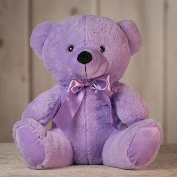 Purple teddy bear with a satin ribbon bow