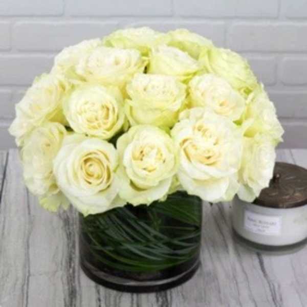 White rose bouquet in a glass vase