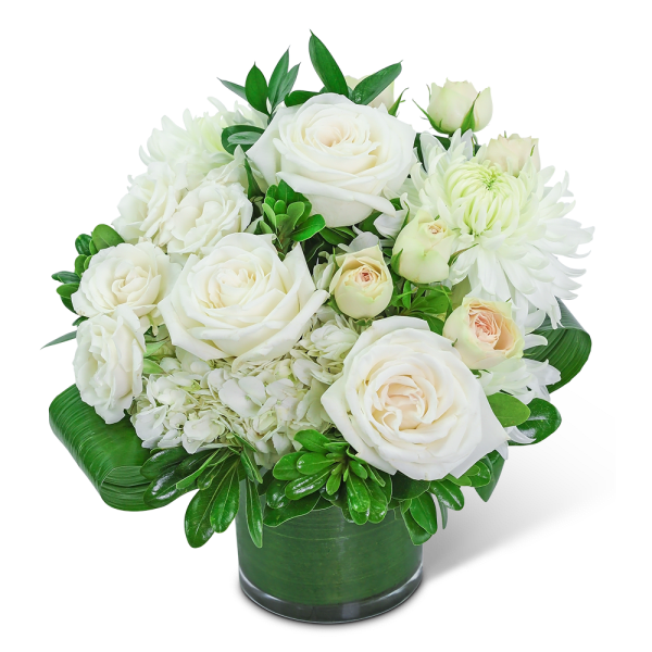 White roses and chrysanthemums arranged in a green vase