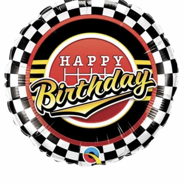 Round birthday balloon with black, white, red, and yellow graphics