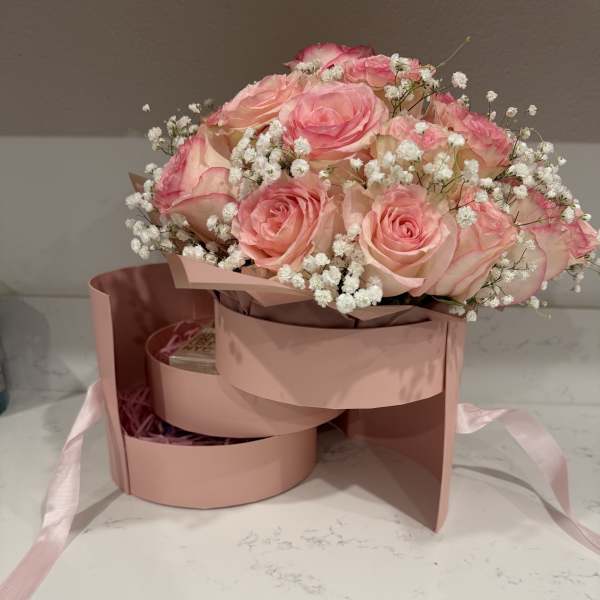Pink rose bouquet in a blush gift box with white baby's breath