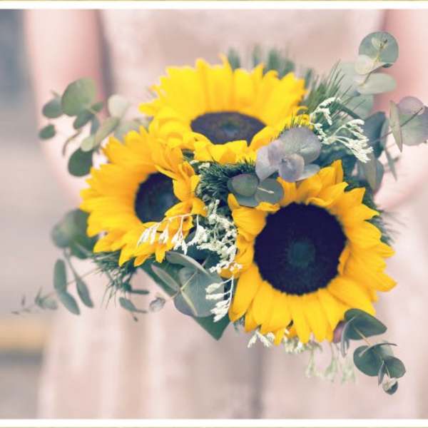 Bouquet of sunflowers with eucalyptus greenery