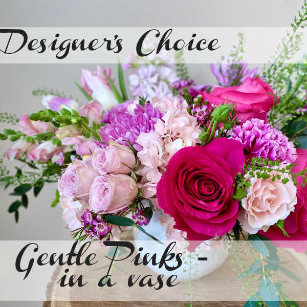 Pink and lavender bouquet in a white vase