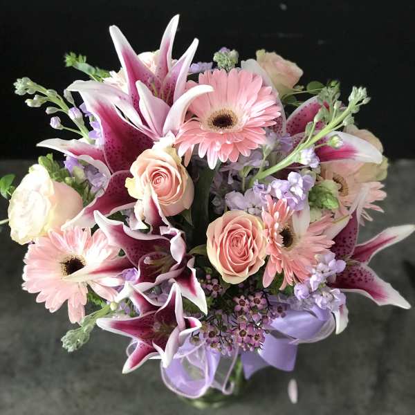 Pink and white mixed bouquet with lilies, roses, and gerbera daisies