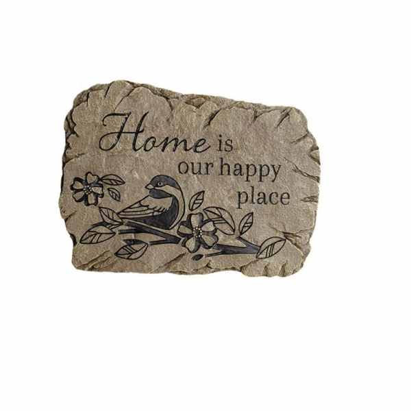 Decorative stone plaque with a bird and flowers and the words "Home is our happy place"