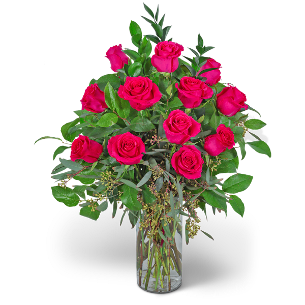 Pink roses in a clear glass vase