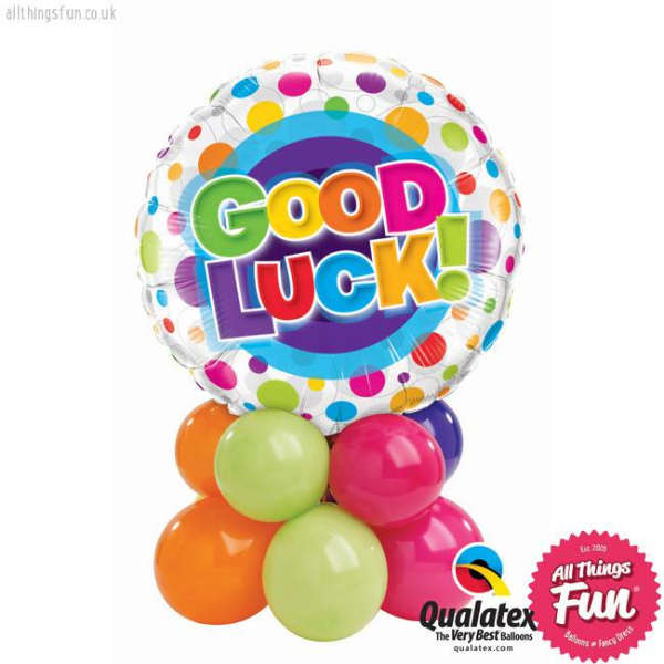 Good Luck balloon with colorful polka dots and a cluster of balloons below
