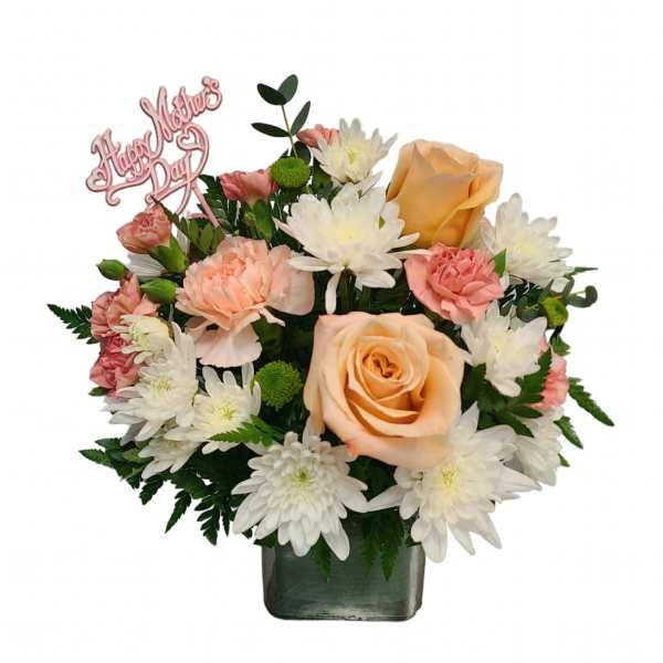 Peach roses and white daisies in a square vase with a Mother's Day topper