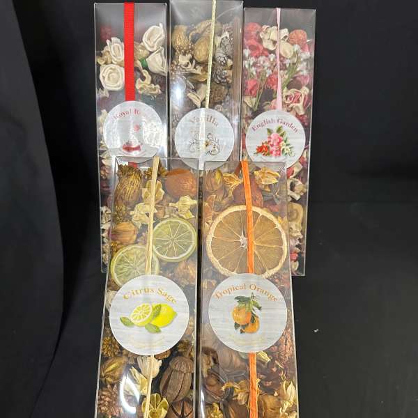 Assorted dried flower gift boxes with ribbon ties
