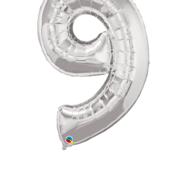 Silver foil balloon shaped like the number 9
