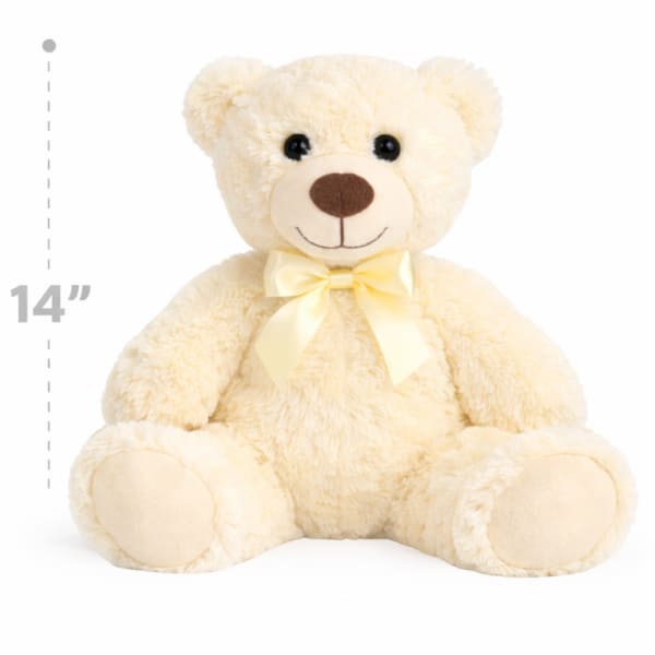 Cream teddy bear with a yellow ribbon bow