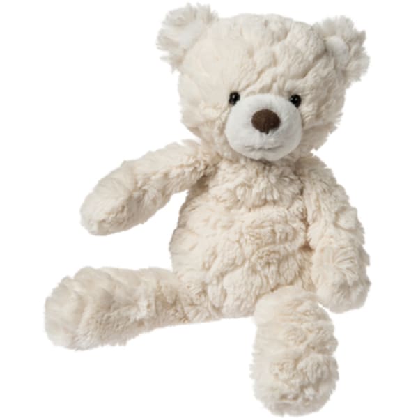 Cream teddy bear plush toy sitting on a white background