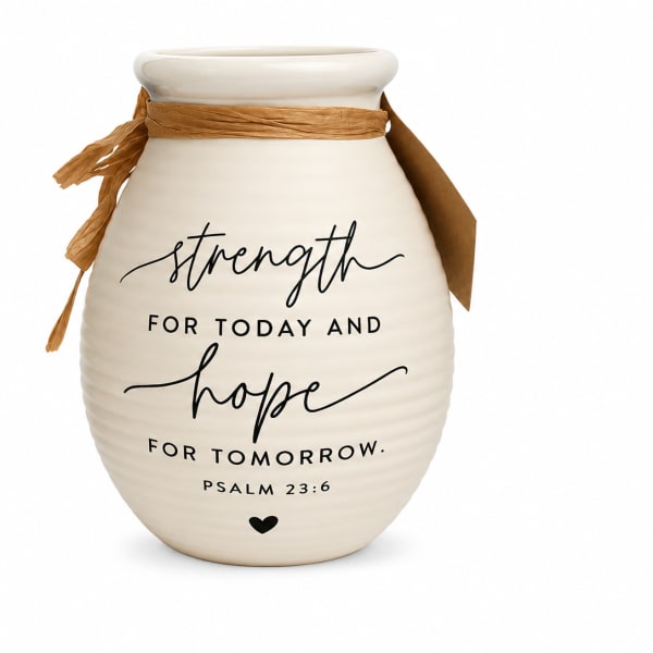 Cream ceramic vase with the words strength and hope printed on it