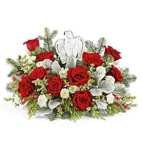 Red roses with white accents and an angel ornament