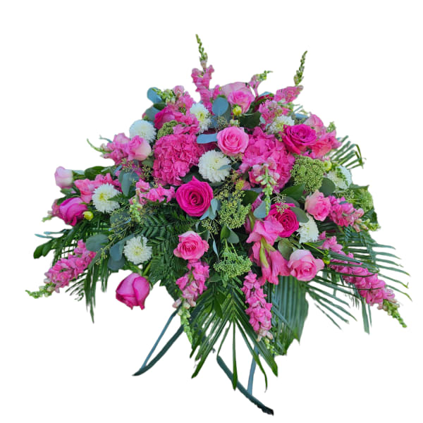 Large pink floral spray with roses and white blooms