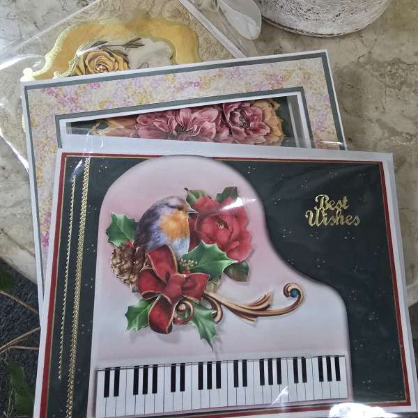 Decorative greeting cards with floral and bird designs