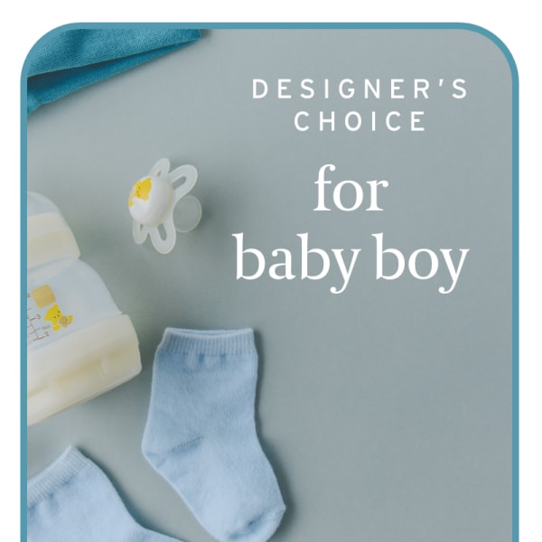 Baby socks, pacifier, and bottle on a blue card reading "designer's choice for baby boy"