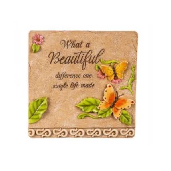 Decorative plaque with butterflies, flowers, and inspirational text