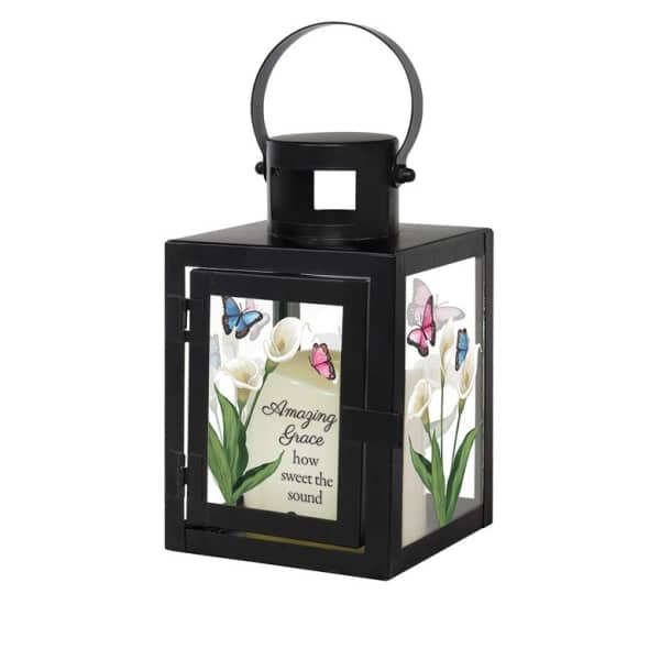 Black lantern with floral panels and the words Amazing Grace
