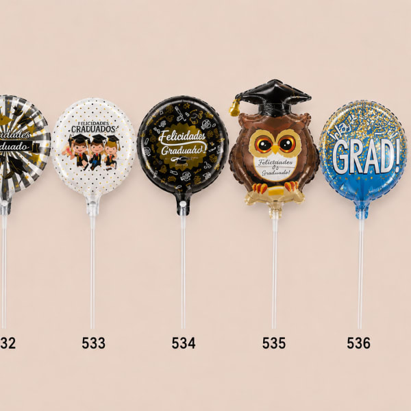 Six graduation balloons with Spanish congratulatory text on sticks