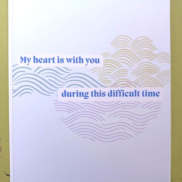 Sympathy greeting card with blue text and abstract wave patterns in soft colors