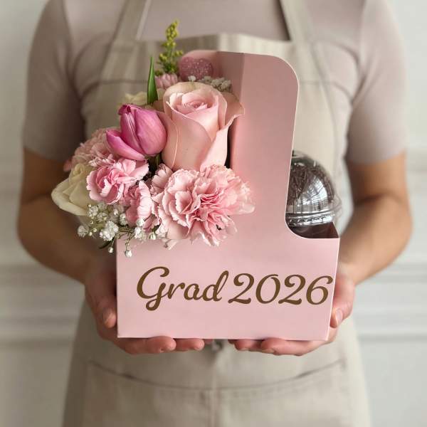 Pink floral graduation gift box with roses, tulips, and carnations