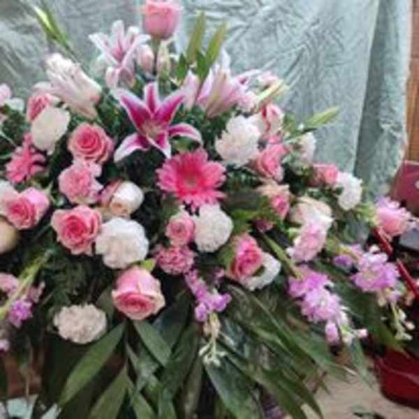 Large pink and white floral spray with lilies and roses